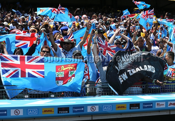 2018RugbySevensSun-12.JPG - Fiji and New Zealand fans react during the men's championship semi finals match in the 2018 Rugby World Cup Sevens, Sunday, July 22, 2018, at AT&T Park, San Francisco. New Zealand defeated Fiji 22-17. (Spencer Allen/IOS via AP)